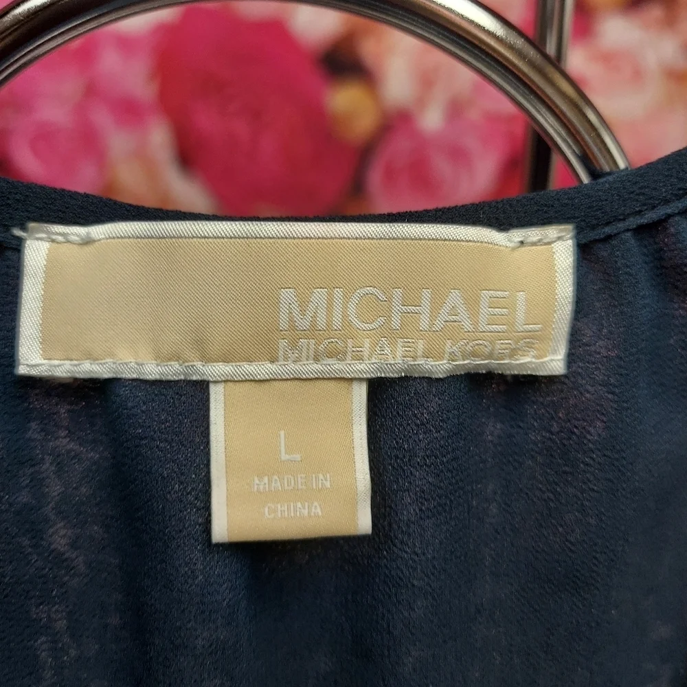 Michael Kors Women's Animal Print Peplum Top Elastic around waist Size Large